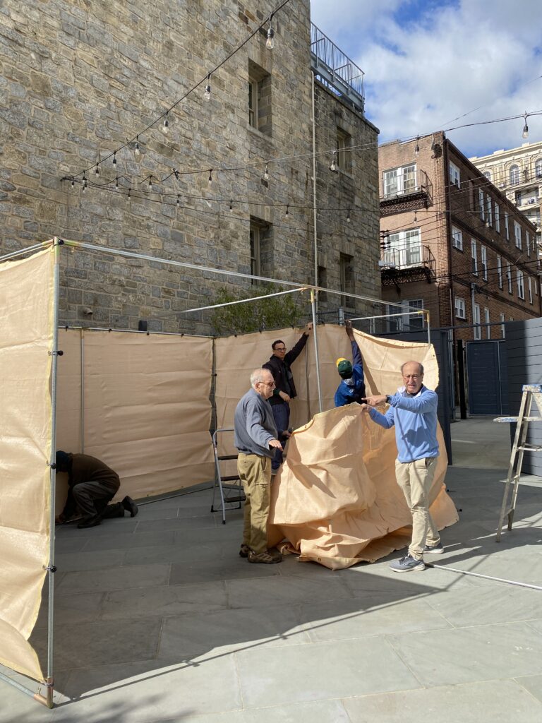 Congregants come together to help us build a new sukkah!